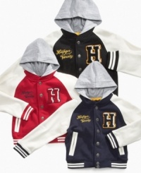 Go varsity! Get your little letterman playing on the right team with a varsity jacket from Tommy Hilfiger that features an attached hood and a full complement of collegiate detailing. Go varsity! Get your little letterman playing on the right team with a varsity jacket from Tommy Hilfiger that features an attached hood and a full complement of collegiate detailing.