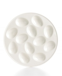 Nest deviled or hard boiled eggs in this Whiteware egg plate from Martha Stewart Collection to prevent accidental rolling. White porcelain ensures a clean, simple presentation fit for any occasion. Nest deviled or hard boiled eggs in this Whiteware egg plate from Martha Stewart Collection to prevent accidental rolling. White porcelain ensures a clean, simple presentation fit for any occasion.