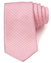 Fine silk is embellished with a pattern of classic dots for a stately look. Fine silk is embellished with a pattern of classic dots for a stately look.