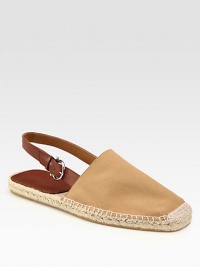 Classic espadrille style with neutral canvas upper and adjustable leather slingback strap.Canvas upperRubber soleImported Classic espadrille style with neutral canvas upper and adjustable leather slingback strap.Canvas upperRubber soleImported
