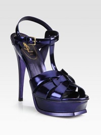 The iconic strappy silhouette rendered in luminous patent leather with a towering heel and platform. Self-covered heel, 5½ (140mm)Covered platform, 1¼ (30mm)Compares to a 4¼ heel (110mm)Patent leather upperAdjustable ankle strapsLeather lining and solePadded insoleMade in Italy