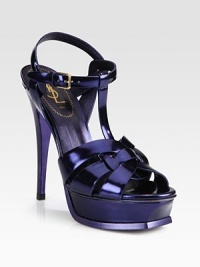 The iconic strappy silhouette rendered in luminous patent leather with a towering heel and platform. Self-covered heel, 5½ (140mm)Covered platform, 1¼ (30mm)Compares to a 4¼ heel (110mm)Patent leather upperAdjustable ankle strapsLeather lining and solePadded insoleMade in Italy The iconic strappy silhouette rendered in luminous patent leather with a towering heel and platform. Self-covered heel, 5½ (140mm)Covered platform, 1¼ (30mm)Compares to a 4¼ heel (110mm)Patent leather upperAdjustable ankle strapsLeather lining and solePadded insoleMade in Italy