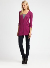 An elongated boyfriend cardigan made from Italian merino wool with a flattering and feminine fit.V-neckLong sleevesAbout 31 from shoulder to hemMerino woolDry cleanImported of Italian fabricSIZE & FIT Model shown is 5'10½ (179cm) wearing a US size Small. An elongated boyfriend cardigan made from Italian merino wool with a flattering and feminine fit.V-neckLong sleevesAbout 31 from shoulder to hemMerino woolDry cleanImported of Italian fabricSIZE & FIT Model shown is 5'10½ (179cm) wearing a US size Small.