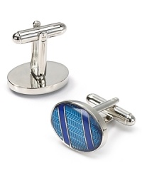 Grounded with an unexpected graphic herringbone pattern and featuring two diagonal stripes across the face, these cufflinks punch up your dress shirting attire with a unique mix of pattern, color and flash. Grounded with an unexpected graphic herringbone pattern and featuring two diagonal stripes across the face, these cufflinks punch up your dress shirting attire with a unique mix of pattern, color and flash.