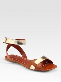 Rich leather silhouette joined by metallic leather straps that weave their way around the ankle concluding with an adjustable strap. Leather and metallic leather upperLeather lining and solePadded insoleImportedOUR FIT MODEL RECOMMENDS ordering true size. Rich leather silhouette joined by metallic leather straps that weave their way around the ankle concluding with an adjustable strap. Leather and metallic leather upperLeather lining and solePadded insoleImportedOUR FIT MODEL RECOMMENDS ordering true size.
