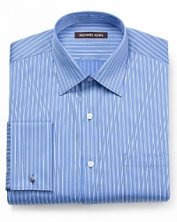Combine this smart dress shirt with a lavish silk tie for a striking combination at the office and after hours. Combine this smart dress shirt with a lavish silk tie for a striking combination at the office and after hours.