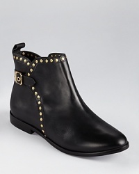 These little black booties from Pour La Victoire lend a feminine look with edge--golden studs accent a short silhouette. These little black booties from Pour La Victoire lend a feminine look with edge--golden studs accent a short silhouette.