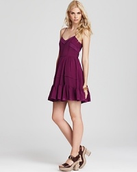 Splashed against bare skin, a vibrantly Juicy Couture sundress is your answer to summer style. Slip on stacked heels and transform the daytime staple into a sleek evening alternative. Splashed against bare skin, a vibrantly Juicy Couture sundress is your answer to summer style. Slip on stacked heels and transform the daytime staple into a sleek evening alternative.