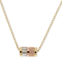 Glamour makes a comeback with Michael Kors' pendant necklace! Features a barrel-shaped pendant embellished with rosy pave accents and clear, baguette-cut stones. Crafted in gold tone mixed metal. Approximate length: 16 inches. Approximate drop: 1/2 inch. Glamour makes a comeback with Michael Kors' pendant necklace! Features a barrel-shaped pendant embellished with rosy pave accents and clear, baguette-cut stones. Crafted in gold tone mixed metal. Approximate length: 16 inches. Approximate drop: 1/2 inch.