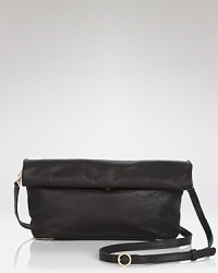 Small scale yet statement-making. See by Chloé sized-down clutch is a cool desk-to-dinner companion with luxurious leather and a versatile shoulder strap. Small scale yet statement-making. See by Chloé sized-down clutch is a cool desk-to-dinner companion with luxurious leather and a versatile shoulder strap.