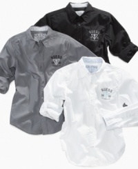 Roll tabs on these Core shirts from Guess keep sleeves from falling and keep his style fresh - no wonder they're a hit for fall! Roll tabs on these Core shirts from Guess keep sleeves from falling and keep his style fresh - no wonder they're a hit for fall!