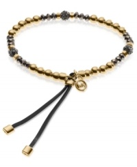 Go for the bold with this stretch bracelet from Michael Kors. Crafted from gold and hematite ion-plated mixed metal, the bracelet dazzles with fireball beads adding luster. Approximate diameter: 2-1/4 inches. Go for the bold with this stretch bracelet from Michael Kors. Crafted from gold and hematite ion-plated mixed metal, the bracelet dazzles with fireball beads adding luster. Approximate diameter: 2-1/4 inches.