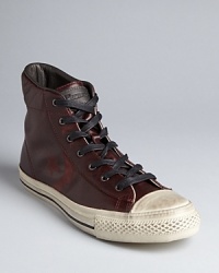 Inspired by vintage sneaker designs, John Varvatos and Converse partner in a unique and powerful collaboration that results in this striking high top, perfect for your nights out or when your casual look needs a heavy dose of cool. Check out the effaced leather logo treatment on the side for that extra bit of flair. Inspired by vintage sneaker designs, John Varvatos and Converse partner in a unique and powerful collaboration that results in this striking high top, perfect for your nights out or when your casual look needs a heavy dose of cool. Check out the effaced leather logo treatment on the side for that extra bit of flair.