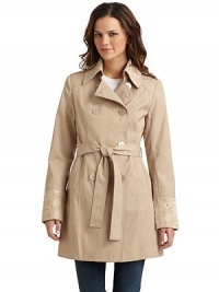 THE LOOKEmbroidered eyelet point collar and cuffsShoulder epaulettesDouble-breasted button front with oversize embossed buttonsRemovable tie-front beltLong sleevesDual front besom pocketsTHE FITAbout 33 from shoulder to hemTHE MATERIALCotton/polyesterFully linedCARE & ORIGINMachine washImportedModel shown is 5'9½ (176cm) wearing US size Small. THE LOOKEmbroidered eyelet point collar and cuffsShoulder epaulettesDouble-breasted button front with oversize embossed buttonsRemovable tie-front beltLong sleevesDual front besom pocketsTHE FITAbout 33 from shoulder to hemTHE MATERIALCotton/polyesterFully linedCARE & ORIGINMachine washImportedModel shown is 5'9½ (176cm) wearing US size Small.