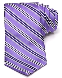 A handsome addition to any man's professional wardrobe, this silk tie from Michael Kors works full-time with a classic stripe design. A handsome addition to any man's professional wardrobe, this silk tie from Michael Kors works full-time with a classic stripe design.