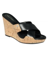 A classy cork wedge. The Evah slide platform sandals by Calvin Klein are so versatile that they'll put a great finishing touch on anything in your closet. A classy cork wedge. The Evah slide platform sandals by Calvin Klein are so versatile that they'll put a great finishing touch on anything in your closet.