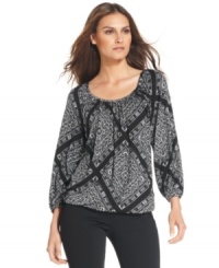 MICHAEL Michael Kors' petite top features a breezy blouson-fit and a cascading scarf-print, creating a charming illusion. MICHAEL Michael Kors' petite top features a breezy blouson-fit and a cascading scarf-print, creating a charming illusion.