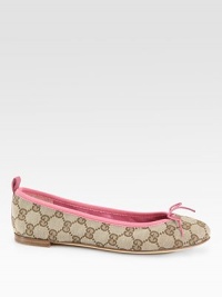 Signature GG flat with leather trim and leather bow detail. GG printed fabric upperLeather liningBuffed leather solePadded insoleMade in ItalyOUR FIT MODEL RECOMMENDS ordering one half size down as this style runs large. Signature GG flat with leather trim and leather bow detail. GG printed fabric upperLeather liningBuffed leather solePadded insoleMade in ItalyOUR FIT MODEL RECOMMENDS ordering one half size down as this style runs large.