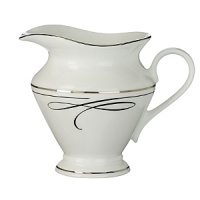 Waterford's Ballet Ribbon bone china dinnerware echoes the graceful forms and lines of the interpretive dance and the satin ribbons which adorn ballerinas' costumes and pointe shoes. Mix in the brightly colored accent plates to make your table pop or to blend the pattern into your dining décor. Waterford's Ballet Ribbon bone china dinnerware echoes the graceful forms and lines of the interpretive dance and the satin ribbons which adorn ballerinas' costumes and pointe shoes. Mix in the brightly colored accent plates to make your table pop or to blend the pattern into your dining décor.