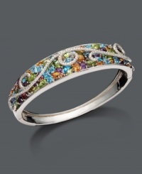 Vivid sparkle perfect for the most special occasion. Multistone bangle features round-cut diamond swirls (3/8 ct. t.w.) highlighted by citrine (2-1/6 ct. t.w.), white topaz (1/8 ct. t.w.), pink tourmaline (3/4 ct. t.w.), blue topaz (4 ct. t.w.), peridot (4-1/3 ct. t.w.), and amethyst (1-1/2 ct. t.w.). Crafted in sterling silver. Approximate diameter: 2 inches. Vivid sparkle perfect for the most special occasion. Multistone bangle features round-cut diamond swirls (3/8 ct. t.w.) highlighted by citrine (2-1/6 ct. t.w.), white topaz (1/8 ct. t.w.), pink tourmaline (3/4 ct. t.w.), blue topaz (4 ct. t.w.), peridot (4-1/3 ct. t.w.), and amethyst (1-1/2 ct. t.w.). Crafted in sterling silver. Approximate diameter: 2 inches.