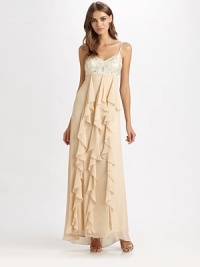 A prettily embroidered bust gives way to a tiered, artfully draped floor-length skirt.Adjustable spaghetti strapsEmbroidered bustSkirt tiersConcealed side zipFully linedAbout 65 from shoulder to hem70% polyester/30% nylonSpot cleanImportedModel shown is 5'11 (180cm) wearing US size 4. A prettily embroidered bust gives way to a tiered, artfully draped floor-length skirt.Adjustable spaghetti strapsEmbroidered bustSkirt tiersConcealed side zipFully linedAbout 65 from shoulder to hem70% polyester/30% nylonSpot cleanImportedModel shown is 5'11 (180cm) wearing US size 4.