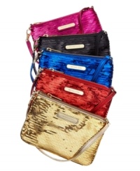 Store your stash in style with this glam wristlet from MICHAEL Michael Kors. Dressed in shimmery sequin and signature hardware, it keeps cash, cards, and other out-on-the-town essentials easily at hand. Store your stash in style with this glam wristlet from MICHAEL Michael Kors. Dressed in shimmery sequin and signature hardware, it keeps cash, cards, and other out-on-the-town essentials easily at hand.