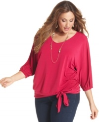 Tie up chic casual style with Jones New York Signature's three-quarter-sleeve plus size top, punctuated by a banded hem. Tie up chic casual style with Jones New York Signature's three-quarter-sleeve plus size top, punctuated by a banded hem.