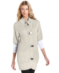 MICHAEL Michael Kors' luxe petite waffle-knit sweater is studded with signature logo hardware closures at the front placket. MICHAEL Michael Kors' luxe petite waffle-knit sweater is studded with signature logo hardware closures at the front placket.