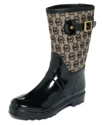 Puddle jump with no problem. MICHAEL Michael Kors' Monogram mid-calf rain boots feature a classic print and the designer's logo on the side. Puddle jump with no problem. MICHAEL Michael Kors' Monogram mid-calf rain boots feature a classic print and the designer's logo on the side.