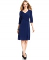 Look your best in this sexy petite B-Slim dress by Elementz. It's got a flattering shape with a built-in slimming lining for a smooth silhouette.