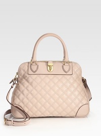 This elegantly quilted style is constructed with luxurious leather and features a decorative push-lock detail. Double top handles, 5 dropAdjustable shoulder strap, 17-22¾ dropTop zip closureProtective metal feetOne outside open pocketCotton lining14½W X 10H X 5½DMade in Italy This elegantly quilted style is constructed with luxurious leather and features a decorative push-lock detail. Double top handles, 5 dropAdjustable shoulder strap, 17-22¾ dropTop zip closureProtective metal feetOne outside open pocketCotton lining14½W X 10H X 5½DMade in Italy