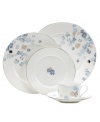 Breezy florals scatter on the white bone china of Water Blossoms dinnerware, suffusing your table with effortless grace. With shimmering platinum petals and banding, the 5-piece place setting makes for an especially pretty table. From Martha Stewart Collection.