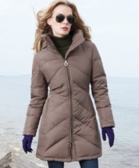 The master of minimalism has done it again: a streamlined petite puffer coat exudes urban polish and sophisticated style. The master of minimalism has done it again: a streamlined petite puffer coat exudes urban polish and sophisticated style.