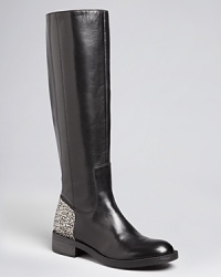 Basic black boots make every day exciting with rhinestone-studded heels that add sparkle to every step, by Enzo Angiolini. Basic black boots make every day exciting with rhinestone-studded heels that add sparkle to every step, by Enzo Angiolini.
