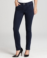 The latest skinnies to hit the scene, coated Isaac Mizrahi Jeans clock in cool with a sleek silhouette and saturated wash. Style with a leather jacket for undeniable urban edge. The latest skinnies to hit the scene, coated Isaac Mizrahi Jeans clock in cool with a sleek silhouette and saturated wash. Style with a leather jacket for undeniable urban edge.