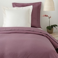From the name synonymous with luxury bedding, this Edmond Frette duvet cover in luminous sateen jacquard lends regal elegance to your bedding collection. From the name synonymous with luxury bedding, this Edmond Frette duvet cover in luminous sateen jacquard lends regal elegance to your bedding collection.