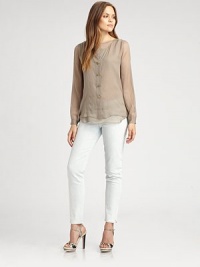 Undeniably flattering, this ethereal, silk top is the perfect go-to piece this season.Button frontLong sleevesButton cuffsBack yokeSilkDry cleanImported Model shown is 5'10 (177cm) wearing US size Small. OUR FIT MODEL RECOMMENDS ordering true size. Undeniably flattering, this ethereal, silk top is the perfect go-to piece this season.Button frontLong sleevesButton cuffsBack yokeSilkDry cleanImported Model shown is 5'10 (177cm) wearing US size Small. OUR FIT MODEL RECOMMENDS ordering true size.