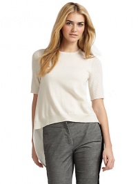 THE LOOKShort, open-knit sleevesRibbed cuffs and hemKnit cashmere front; woven silk backBack button closureTuxedo shirttail backAsymmetric, side-split hemTHE FITAbout 30 from shoulder to longest point of hemTHE MATERIALFront: cashmereBack: silkCARE & ORIGINDry cleanImportedModel shown is 5'10 (177cm) wearing US size Small. THE LOOKShort, open-knit sleevesRibbed cuffs and hemKnit cashmere front; woven silk backBack button closureTuxedo shirttail backAsymmetric, side-split hemTHE FITAbout 30 from shoulder to longest point of hemTHE MATERIALFront: cashmereBack: silkCARE & ORIGINDry cleanImportedModel shown is 5'10 (177cm) wearing US size Small.