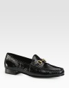 Glassy patent leather loafers adorned by a 60th-anniversary horsebit buckle. Patent leather upperLeather lining and solePadded insoleMade in Italy