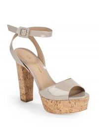 THE LOOKPatent leather horizontal strapCrisscross adjustable ankle strapPadded insoleCork heel, 5 (125mm)Cork platform, 1¼ (30mm)Compares to a 3¾ heel (95mm)THE MATERIALPatent leather upperLeather lining and soleORIGINImported THE LOOKPatent leather horizontal strapCrisscross adjustable ankle strapPadded insoleCork heel, 5 (125mm)Cork platform, 1¼ (30mm)Compares to a 3¾ heel (95mm)THE MATERIALPatent leather upperLeather lining and soleORIGINImported