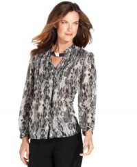 A chic print and subtle pleats give this petite shirt from Jones New York Signature a stylish upgrade! A chic print and subtle pleats give this petite shirt from Jones New York Signature a stylish upgrade!