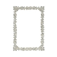 House your precious memories in a stunning frame of Swarovski® crystals finished with silver-tone metal for a sparkling display worthy of your photos.