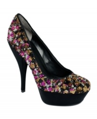 Sparkle the night away. The colorful sequin upper of Nine West's Piggy platform pumps make this look an amazing one, no matter what you pair them with. Sparkle the night away. The colorful sequin upper of Nine West's Piggy platform pumps make this look an amazing one, no matter what you pair them with.