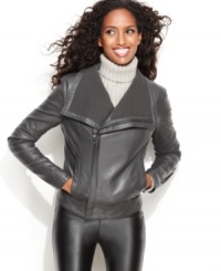 Kenneth Cole Reaction's faux leather bomber jacket features clean lines and a cozy knit lining for a look that's at once classic and totally right now! Kenneth Cole Reaction's faux leather bomber jacket features clean lines and a cozy knit lining for a look that's at once classic and totally right now!