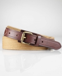 Supple leather tabs and an antiqued metal roller buckle lend relaxed refinement to a cotton web belt. Supple leather tabs and an antiqued metal roller buckle lend relaxed refinement to a cotton web belt.