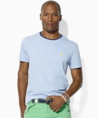 Vibrant pops of color and Ralph Lauren's iconic pony enliven an essential crewneck crafted from soft jersey with sleek stripes. Vibrant pops of color and Ralph Lauren's iconic pony enliven an essential crewneck crafted from soft jersey with sleek stripes.