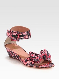 A blooming floral print freshens this nylon design with a wide ankle strap and pleated bow adornment. Self-covered wedge, 1¾ (45mm)Nylon upperAdjustable ankle strapLeather lining and solePadded insoleMade in Italy A blooming floral print freshens this nylon design with a wide ankle strap and pleated bow adornment. Self-covered wedge, 1¾ (45mm)Nylon upperAdjustable ankle strapLeather lining and solePadded insoleMade in Italy