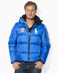 A plush down jacket is constructed with a detachable hood and adorned with Ralph Lauren's Big Pony for unparalleled cold-weather warmth and style. A plush down jacket is constructed with a detachable hood and adorned with Ralph Lauren's Big Pony for unparalleled cold-weather warmth and style.
