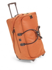 THE LOOKTwo-wheel duffelLeather double top handlesRemovable, adjustable webbed cotton shoulder strapRetractable locking handleRemovable luggage tagTop zip closureOne outside zip pocketTwo protective bottom feetOne inside zip pocketInterior cross straps for organized packingTHE MEASUREMENTDouble top handles, 9 dropAdjustable shoulder strap, 13-26 dropLocking handle THE LOOKTwo-wheel duffelLeather double top handlesRemovable, adjustable webbed cotton shoulder strapRetractable locking handleRemovable luggage tagTop zip closureOne outside zip pocketTwo protective bottom feetOne inside zip pocketInterior cross straps for organized packingTHE MEASUREMENTDouble top handles, 9 dropAdjustable shoulder strap, 13-26 dropLocking handle