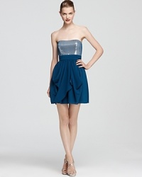Aqua's party-perfect dress features a tonal sequined bust and dramatic draping at the skirt. Aqua's party-perfect dress features a tonal sequined bust and dramatic draping at the skirt.